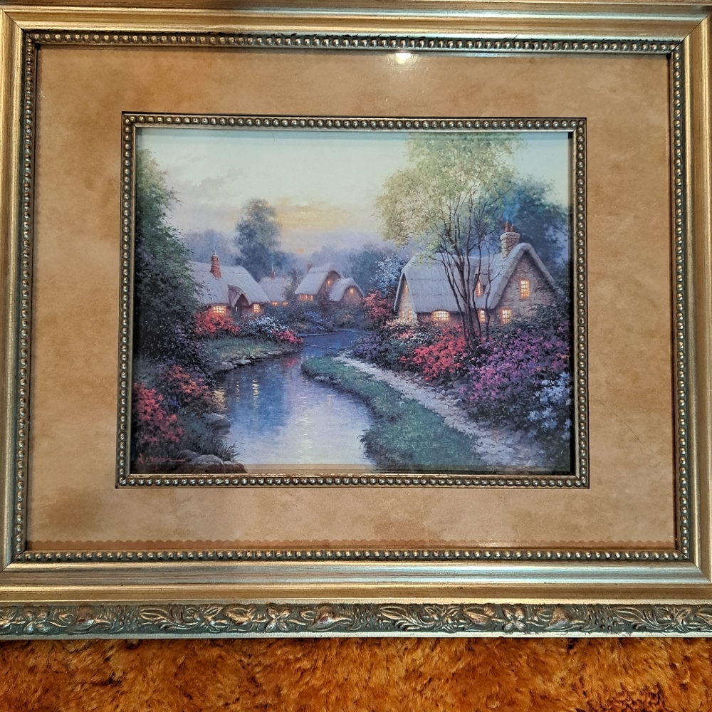 (2) Thomas Kinkade pictures 17" x 14" each.